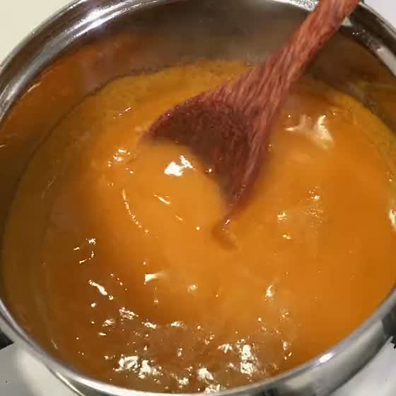 Mole amarillo stirred in the pan until it is glossy