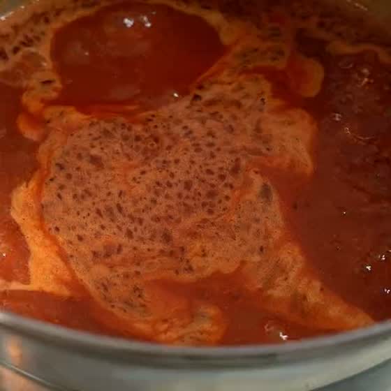 Mole coloradito simmering in the pan