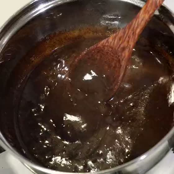 Mole negro stirred in the pan until it is glossy